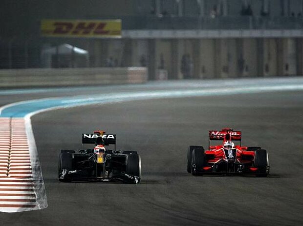 Jarno Trulli, Timo Glock Jarno Trulli, Timo Glock