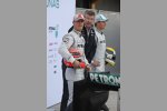 Michael Schumacher (Mercedes) Ross Brawn (Teamchef) Nico Rosberg (Mercedes) 