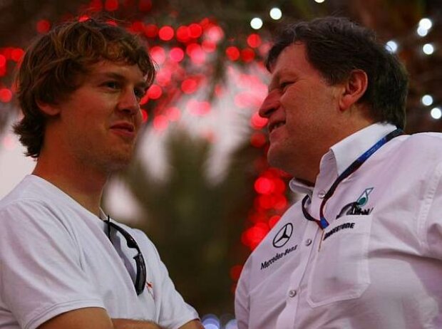 Titel-Bild zur News: Norbert Haug (Mercedes-Motorsportchef), Sebastian Vettel