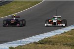 Jaime Alguersuari (Toro Rosso) Adrian Sutil (Force India) 