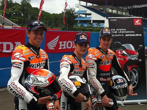Casey Stoner, Daniel Pedrosa, Andrea Dovizioso Casey Stoner, Daniel Pedrosa, Andrea Dovizioso