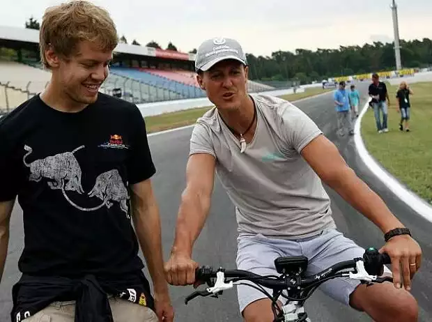 Titel-Bild zur News: Sebastian Vettel, Michael Schumacher
