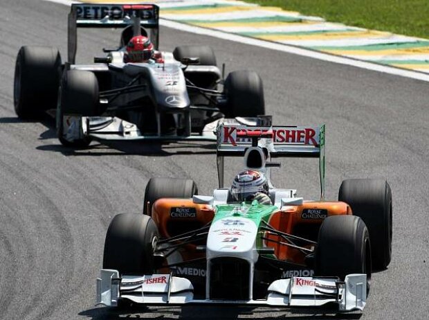 Michael Schumacher, Adrian Sutil Michael Schumacher, Adrian Sutil