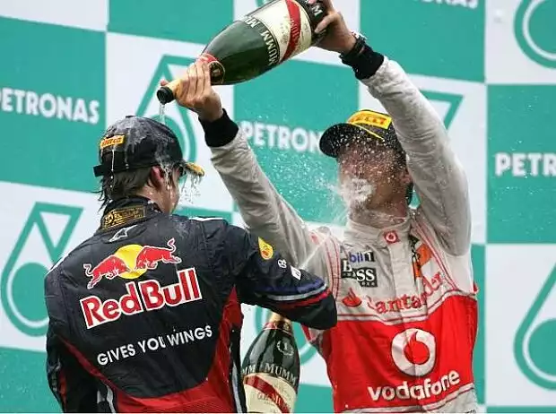 Titel-Bild zur News: Sebastian Vettel, Jenson Button
