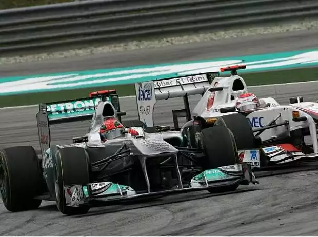 Michael Schumacher, Kamui Kobayashi Titel-Bild zur News: Michael Schumacher, Kamui Kobayashi