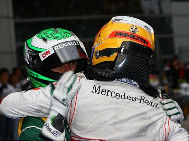 Titel-Bild zur News: Heikki Kovalainen, Lewis Hamilton
