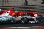 Michael Schumacher (Mercedes) Fernando Alonso (Ferrari) 