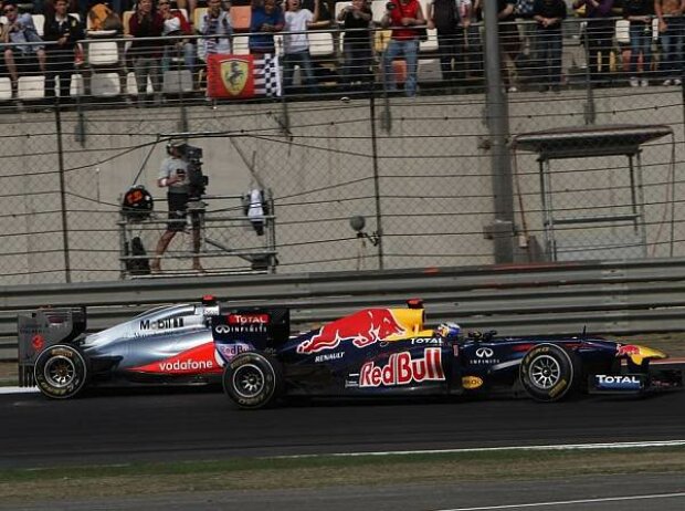 Jenson Button, Sebastian Vettel Jenson Button, Sebastian Vettel