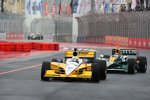 Takuma Sato greift Ryan Briscoe an