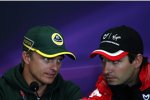 Heikki Kovalainen (Lotus) und Timo Glock (Marussia-Virgin) 