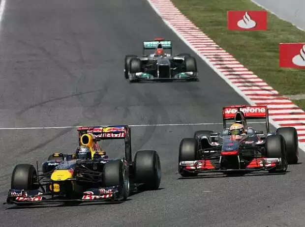 Titel-Bild zur News: Sebastian Vettel, Lewis Hamilton