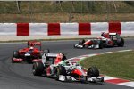 Vitantonio Liuzzi (HRT) und Timo Glock (Marussia-Virgin) 