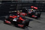 Jerome D'Ambrosio (Marussia-Virgin) vor Lewis Hamilton (McLaren) 