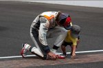 Dan Wheldon feiert seinen zweiten Indy-500-Sieg gemeinsam mit seinem Sohn