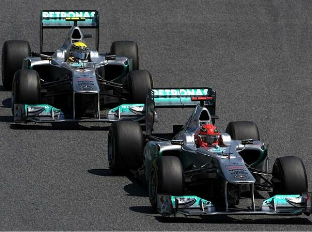 Michael Schumacher, Nico Rosberg Michael Schumacher, Nico Rosberg