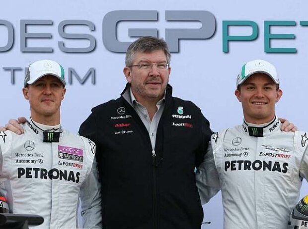 Titel-Bild zur News: Michael Schumacher, Ross Brawn und Nico Rosberg