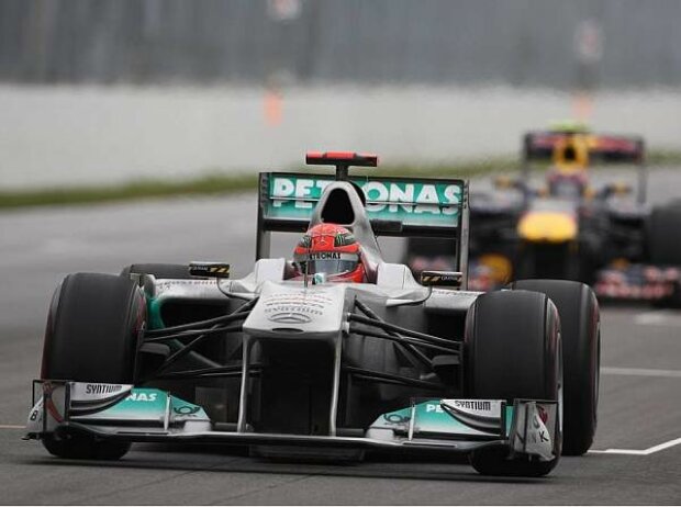 Michael Schumacher, Mark Webber Michael Schumacher, Mark Webber