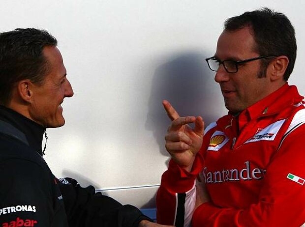 Titel-Bild zur News: Michael Schumacher, Stefano Domenicali (Teamchef)