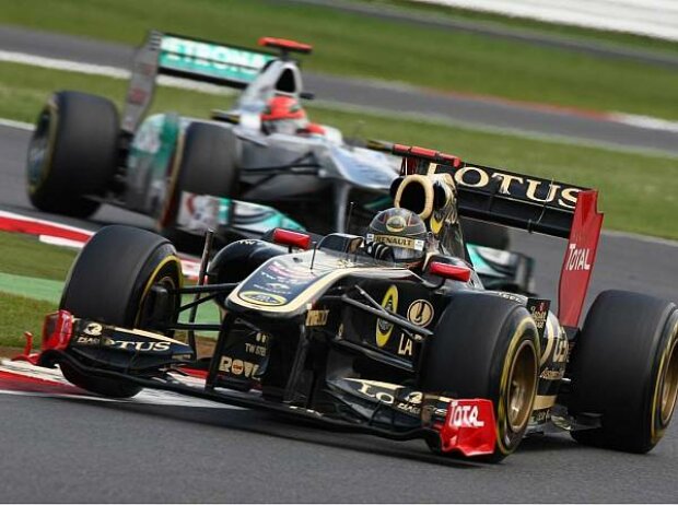 Nick Heidfeld, Michael Schumacher Nick Heidfeld, Michael Schumacher