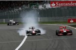 Jerome D'Ambrosio (Marussia-Virgin) außen, Daniel Ricciardo innen mit Verbremser