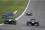 Heikki Kovalainen (Lotus) Sebastien Buemi (Toro Rosso) 