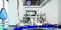 Bild zum Inhalt: Volkswagen-Ausstellung "Blue-e-Motion" im Automobil Forum