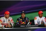 Jenson Button (McLaren), Sebastian Vettel (Red Bull) und Lewis Hamilton (McLaren) 