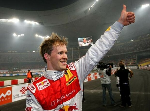 Titel-Bild zur News: Mattias Ekström nach seinem Sieg beim Race of Champions 2009 in Peking