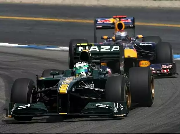 Titel-Bild zur News: Heikki Kovalainen, Sebastian Vettel