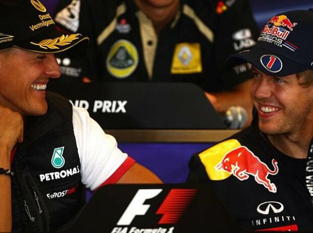 Michael Schumacher, Sebastian Vettel Michael Schumacher, Sebastian Vettel
