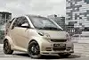 Bild zum Inhalt: IAA 2011: Smart und Wesc stellen goldenen Brabus auf die Räder