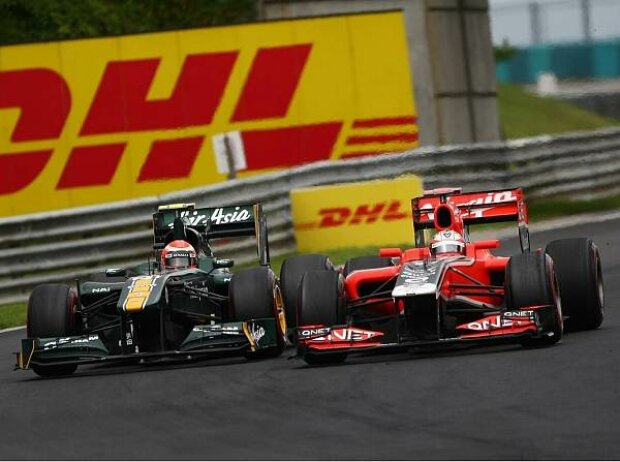 Jarno Trulli, Timo Glock Jarno Trulli, Timo Glock