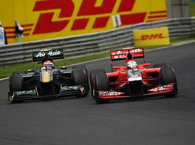 Jarno Trulli, Timo Glock Jarno Trulli, Timo Glock