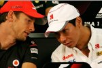 Jenson Button (McLaren) und Kamui Kobayashi (Sauber) 