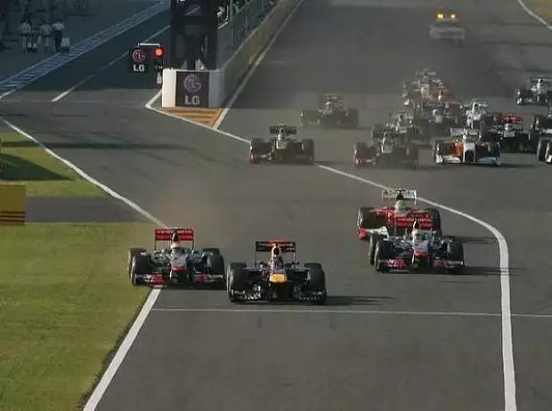Jenson Button neben Sebastian Vettel Titel-Bild zur News: Jenson Button neben Sebastian Vettel