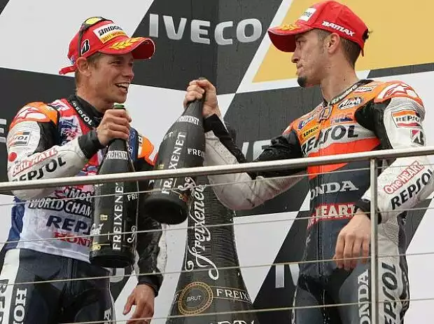 Casey Stoner; Andrea Dovizioso Titel-Bild zur News: Casey Stoner; Andrea Dovizioso