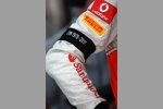 Jenson Button (McLaren) mit Trauerflor für Dan Wheldon 