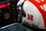 Jarno Trulli (Lotus) mit einem Helm in Gedenken an den tödlich verunglückten Marco Simoncelli