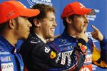 Lewis Hamilton (McLaren), Sebastian Vettel (Red Bull) und Jenson Button (McLaren) 