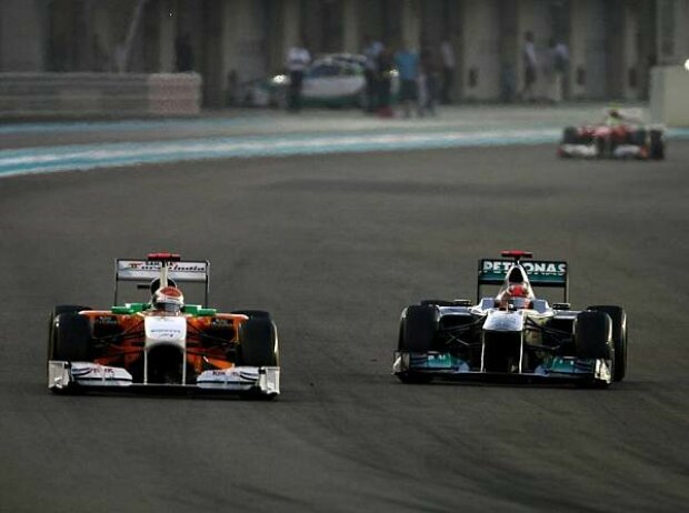 Michael Schumacher, Adrian Sutil Michael Schumacher, Adrian Sutil
