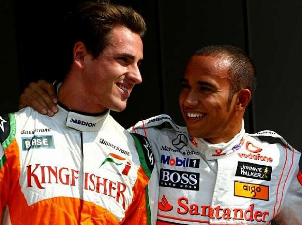 Titel-Bild zur News: Adrian Sutil und Lewis Hamilton