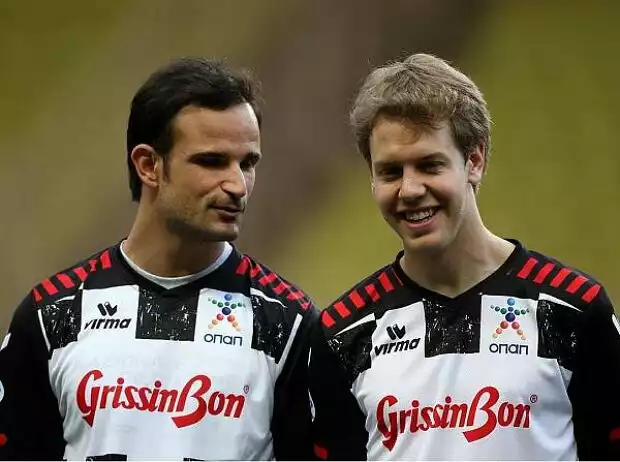 Titel-Bild zur News: Vitantonio Liuzzi und Sebastian Vettel