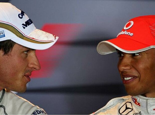 Titel-Bild zur News: Adrian Sutil und Lewis Hamilton