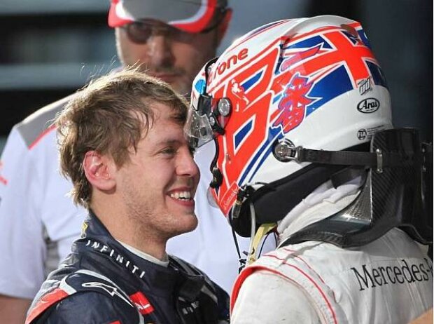Sebastian Vettel, Jenson Button Sebastian Vettel, Jenson Button