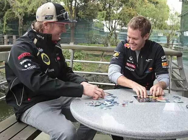 Titel-Bild zur News: Kimi Räikkönen und Sebastian Vettel