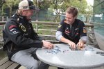 Kimi Räikkönen (Lotus) und Sebastian Vettel (Red Bull) 