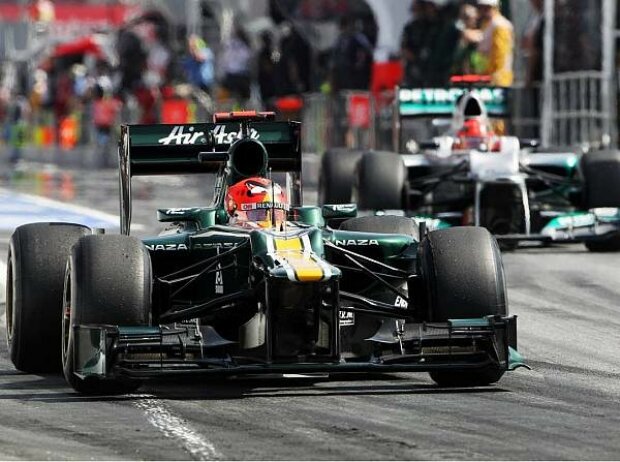 Titel-Bild zur News: Heikki Kovalainen, Michael Schumacher