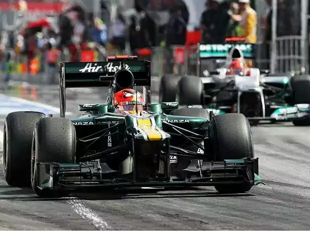 Heikki Kovalainen, Michael Schumacher Titel-Bild zur News: Heikki Kovalainen, Michael Schumacher