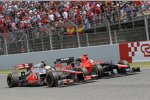 Ungewohntes Duell am Ende des Feldes: Timo Glock (Marussia) und Lewis Hamilton (McLaren) 