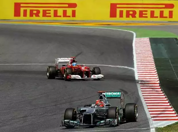 Michael Schumacher, Fernando Alonso Titel-Bild zur News: Michael Schumacher, Fernando Alonso
